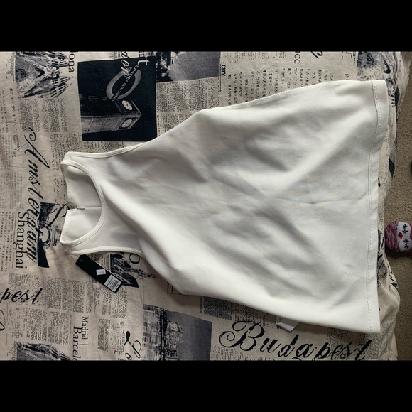 Sleeveless white too. Brand new. - Picture 2 of 4